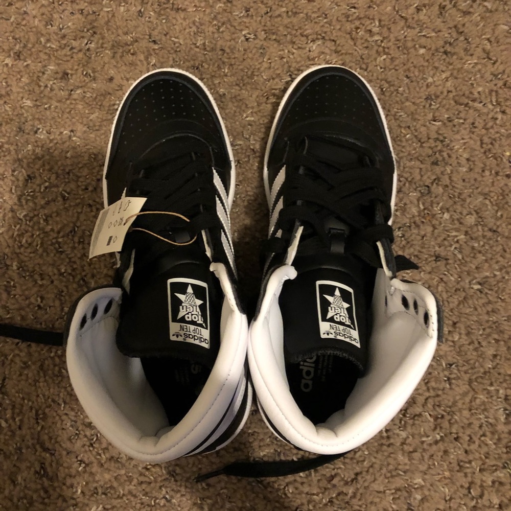 Adidas shoes that never been worn. 8-1/2
